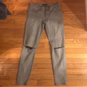 Grey high rise ripped knee jeans